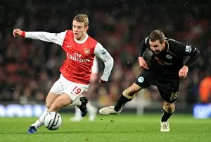 Images Dated 30th November 2010: Jack Wilshere (Arsenal) James Mcarthur (Wigan). Arsenal 2: 0 Wigan Athletic