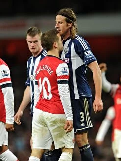 Arsenal v West Bromwich Albion 2012-13 Collection: Jack Wilshere (Arsenal) Jonas Olsson (WBA). Arsenal 2: 0 West Bromwich Albion. Barclays