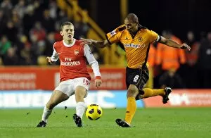 Images Dated 10th November 2010: Jack Wilshere (Arsenal) Karl Henry (Wolves). Wolverhampton Wanderers 0: 2 Arsenal