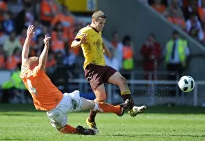 Images Dated 10th April 2011: Jack Wilshere (Arsenal) Keith Southern (Blackpool). Blackpool 1: 3 Arsenal