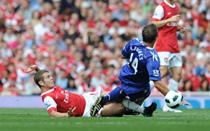 Arsenal v Bolton Wanderers 2010-11 Collection: Jack Wilshere (Arsenal) Kevin Davies (Bolton). Arsenal 4: 1 Blackburn Rovers