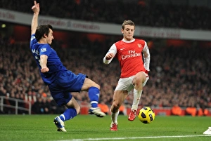 Arsenal v Everton 2010-11 Gallery: Jack Wilshere (Arsenal) Leighton Baines (Everton). Arsenal 2: 1 Everton