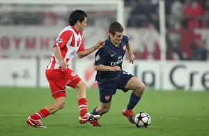 Jack Wilshere (Arsenal) Luciano Galletti (Olympiacos). Olympiacos 1: 0 Arsenal