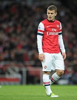 Arsenal v Swansea 2012-13 Collection: Jack Wilshere: Arsenal Midfielder in Action