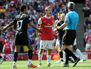 Arsenal V Manchester United 2010-2011 Prints: Jack Wilshere (Arsenal) and Nani (Man Utd) talk to Referee Chris Foy. Arsenal 1