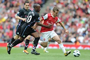 Arsenal V Aston Villa 2010-11 Prints: Jack Wilshere (Arsenal) Nigel Reo-Coker (Aston Villa). Arsenal 1: 2 Aston Villa