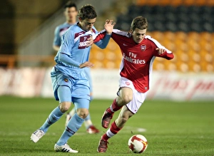Images Dated 9th March 2009: Jack Wilshere (Arsenal) Oliver Lee (West Ham)