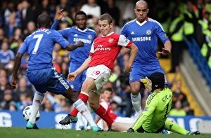 Chelsea v Arsenal 2010-11 Collection: Jack Wilshere (Arsenal) Petr Czech, Ramires and Alex (Chelsea). Chelsea 2: 0 Arsenal