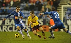 Images Dated 29th December 2010: Jack Wilshere (Arsenal) Ronnie Stam and James McArthur (Wigan). Wigan Athletic 2