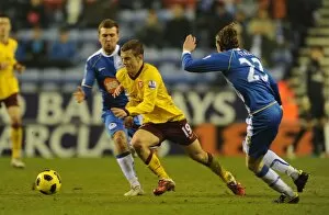 Images Dated 29th December 2010: Jack Wilshere (Arsenal) Ronnie Stam (Wigan). Wigan Athletic 2: 2 Arsenal