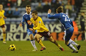 Jack Wilshere (Arsenal) Ronnie Stam (Wigan). Wigan Athletic 2:2 Arsenal Jack Wilshere (Arsenal) Ronnie Stam (Wigan). Wigan Athletic 2:2 Arsenal
