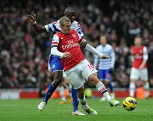 Images Dated 27th October 2012: Jack Wilshere (Arsenal) Samba Diakite (QPR). Arsenal 1: 0 Queens Park Rangers