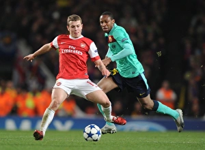 Images Dated 16th February 2011: Jack Wilshere (Arsenal) Seydou Kieta (Barcelona). Arsenal 2: 1 Barcelona