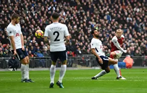 Tottenham Hotspur V Arsenal 2017-18 Prints: Jack Wilshere (Arsenal) shoots under pressure from Mousa Dembele (Tottenham)