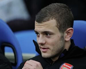 Brighton & Hove Albion v Arsenal FA Cup 2012-13 Collection: Jack Wilshere: Arsenal Star's Determined Return in FA Cup Clash vs. Brighton & Hove Albion (2013)