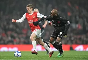 Arsenal v Leyton Orient FA Cup Replay 2010-11 Collection: Jack Wilshere (Arsenal) Terrell Forbes (Orient). Arsenal 5: 0 Leyton Orient