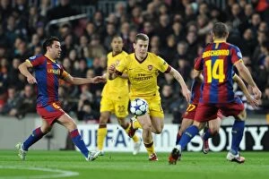 Images Dated 8th March 2011: Jack WIlshere (Arsenal) Xavi (Barcelona). Barcelona 3: 1 Arsenal. UEFA Champions League