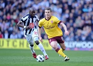 Images Dated 19th March 2011: Jack Wilshere (Arsenal) Youssouf Mulumbu (WBA). West Bromwich Albion 2: 2 Arsenal
