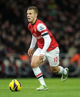 Arsenal v Swansea 2012-13 Collection: Jack Wilshere: Arsenal's Midfield Maestro in Action Against Swansea City, Premier League 2012-13