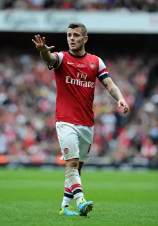 Jack Wilshere: Arsenal's Midfield Maestro in Action Against Stoke City, Premier League 2013-14