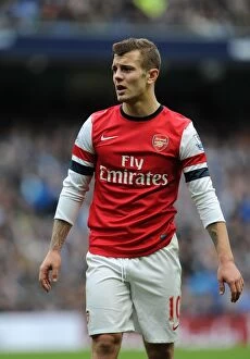 Manchester City v Arsenal 2013-14 Collection: Jack Wilshere: Arsenal's Midfield Maestro Faces Manchester City (2013-14)