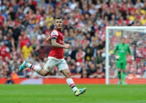 Jack Wilshere: Arsenal's Midfield Mastermind in Action against Stoke City, Premier League 2013-14