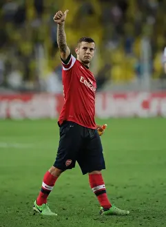 Fenerbahce V Arsenal 2013-14 Prints: Jack Wilshere Celebrates with Arsenal Fans after First Leg of Fenerbahce vs Arsenal