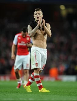 Images Dated 27th August 2014: Jack Wilshere Celebrates with Arsenal Fans after UEFA Champions League Victory over Besiktas