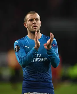 FC Koln V Arsenal 2017-18 Prints: Jack Wilshere Celebrates with Arsenal Fans after UEFA Europa League Victory over FC Koln