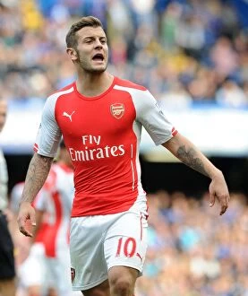 Chelsea v Arsenal 2014-15 Collection: Jack Wilshere Faces Off Against Chelsea in the 2014-15 Premier League