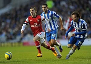 Brighton & Hove Albion v Arsenal FA Cup 2012-13 Collection: Jack Wilshere Faces Off Against Gary Dicker and Inigo Calderon in FA Cup Clash