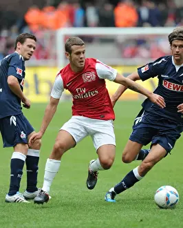 Jack Wilshere Faces Off Against Martin Lanig in Cologne Friendly