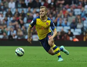 Jack Wilshere Focuses on Arsenal's Victory Against Aston Villa (September 2014)