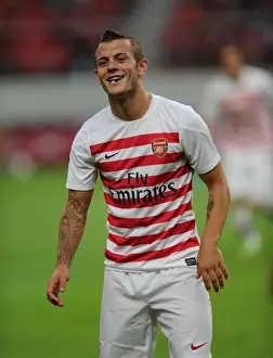 Nagoya Grampus V Arsenal 2013-14 Prints: Jack Wilshere Gears Up for Nagoya Grampus Clash: Arsenal FC's Pre-Season Training in Japan