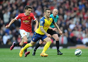 Manchester United V Arsenal 2014-15 Prints: Jack Wilshere Outmaneuvers Ander Herrera: Premier League Showdown between Manchester United and Arsenal (2014-15)