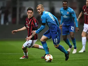 AC Milan V Arsenal 2017-18 Prints: Jack Wilshere Outmaneuvers Davide Calabria: Arsenal vs AC Milan, UEFA Europa League 2018