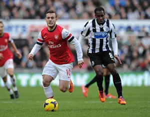 Newcastle United V Arsenal 2013-14 Prints: Jack Wilshere Outmaneuvers Moussa Sissoko: A Battle in the Midfield - Newcastle United vs Arsenal (2013-14)