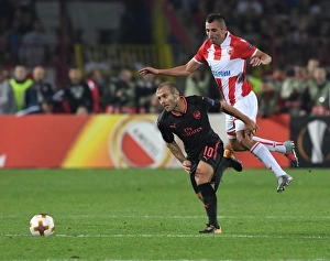 Red Star Belgrade V Arsenal 2017-18 Prints: Jack Wilshere Overpowers Nenad Krsticic