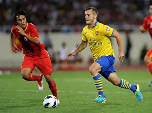 Vietnam V Arsenal 2013-14 Prints: Jack Wilshere Overpowers Pham Nguyen Sa: Vietnam vs Arsenal, 2013