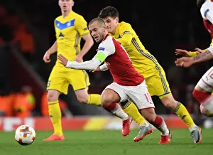Arsenal V BATE Borisov 2017-18 Prints: Jack Wilshere Overpowers Stanislav Dragun: Arsenal FC vs BATE Borisov, UEFA Europa League