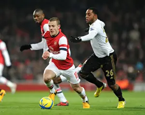 Arsenal V Swansea - FA Cup 3rd Rd Replay 2012-13 Prints: Jack Wilshere Surges Past Kemy Agustien in Arsenal's FA Cup Victory over Swansea
