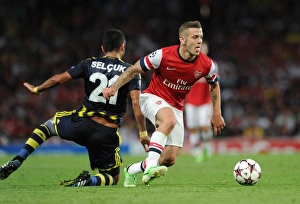 Jack Wilshere vs. Selcuk Sahin: Arsenal's Midfield Battle in Champions League Play-offs (Arsenal v Fenerbahce 2013-14)