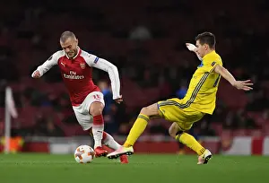 Arsenal V BATE Borisov 2017-18 Prints: Jack Wilshere vs. Aleksei Rios: A Europa League Showdown at Arsenal's Emirates Stadium