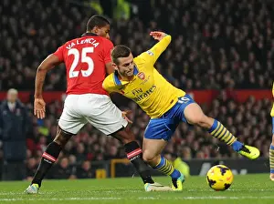 Manchester United V Arsenal 2013-14 Prints: Jack Wilshere vs. Antonio Valencia: Battle at Old Trafford - Manchester United vs