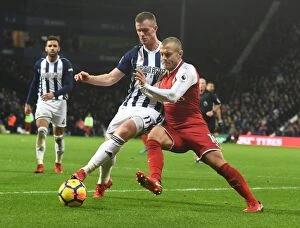West Bromwich Albion v Arsenal 2017-18 Collection: Jack Wilshere vs. Chris Brunt: A Midfield Battle at The Hawthorns (Arsenal vs)