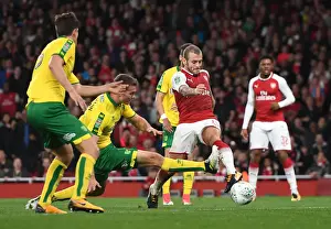 Arsenal V Norwich - Carabo Cup 4th Round 2017-18 Prints: Jack Wilshere vs. Christoph Zimmermann: A Battle in the Carabao Cup Clash Between Arsenal and Norwich