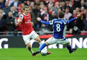 Images Dated 27th February 2011: Jack Wilshere vs Craig Gardner: Arsenal's Defeat in the Carling Cup Final against Birmingham City