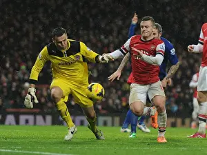 Arsenal V Cardiff City 2013-14 Prints: Jack Wilshere vs. David Marshall: Intense Battle at Arsenal's Emirates Stadium (Arsenal v Cardiff City)