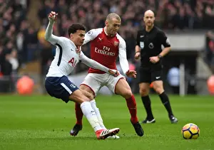Tottenham Hotspur V Arsenal 2017-18 Prints: Jack Wilshere vs Dele Alli: Intense Rivalry in Tottenham Hotspur vs Arsenal Clash