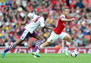 Arsenal V Aston Villa 2013-14 Prints: Jack Wilshere vs Fabian Delph: Battle in Midfield - Arsenal v Aston Villa